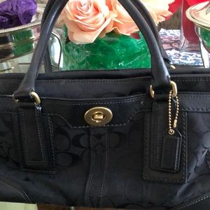 Great coach bag with abundance of storage.